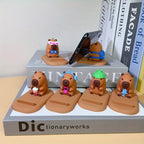 Suporte de Telemóvel Capivara — Base Antiderrapante Decorativa para Secretária