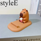 Suporte de Telemóvel Capivara — Base Antiderrapante Decorativa para Secretária
